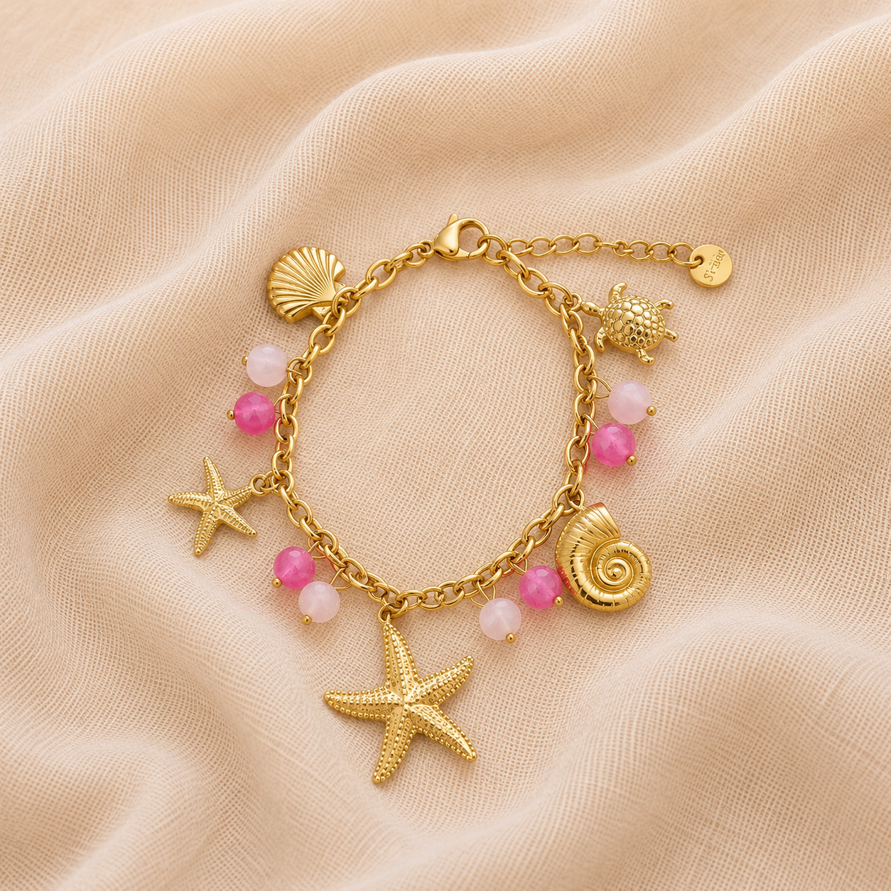 Bracelet breloques roses et étoile de mer