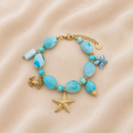 Bracelet bleu breloques marines
